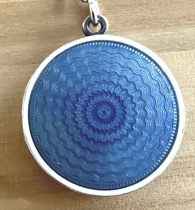 Carol’s blue enamel locket